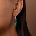 The Alligator earrings worn